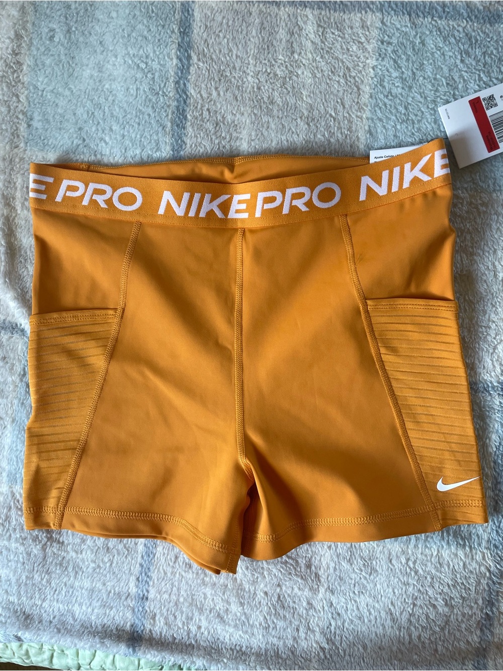 Nike Pro Women's Orange Bike Shorts with Branded Waistband